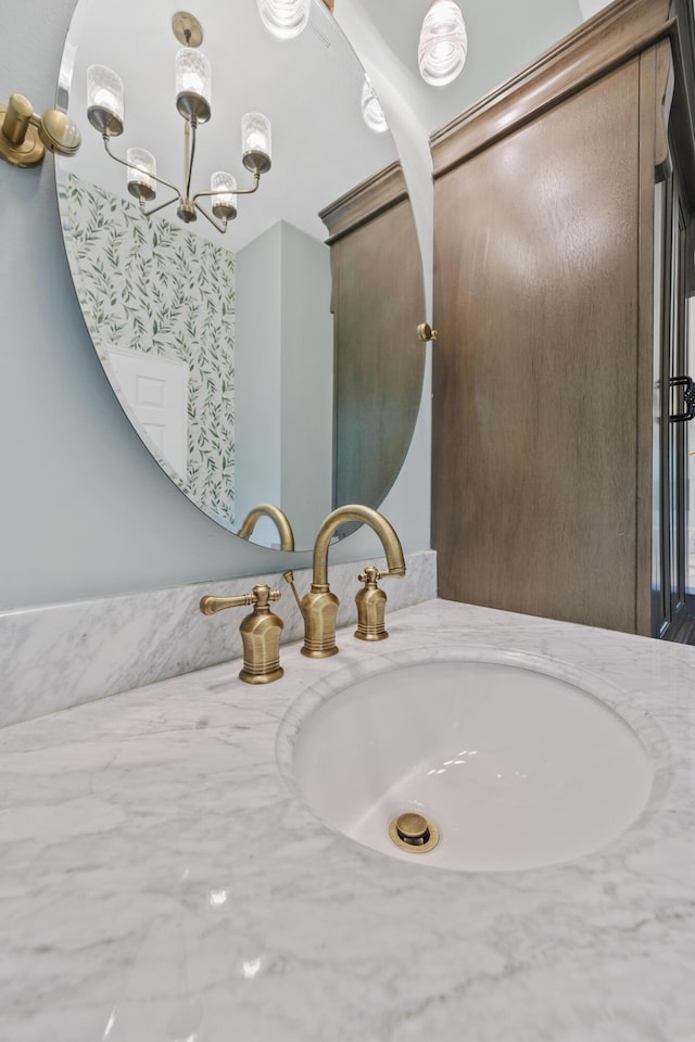 534 Creekridge Rd, Aiken, SC 29803 - bathroom with vanity and a chandelier