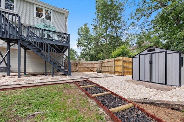 534 Creekridge Rd, Aiken, SC 29803 - fenced backyard featuring a storage shed, a deck, and stairway