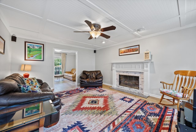 534 Creekridge Rd, Aiken, SC 29803 - living room with wood finished floors, ceiling fan, a high end fireplace, crown molding, and coffered ceiling