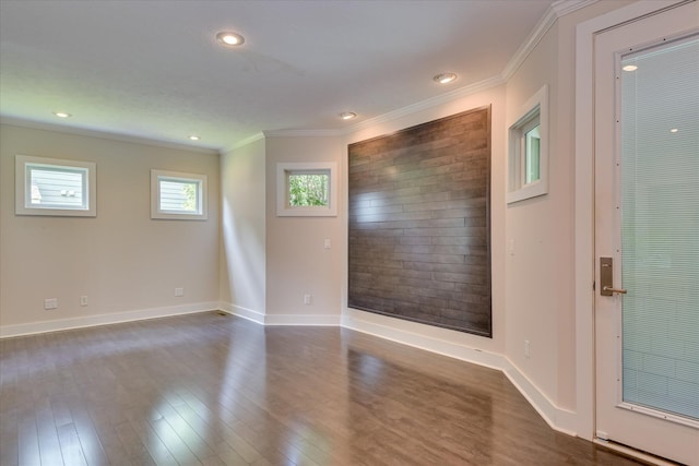 525 Brigham Trl, Augusta, GA 30909 - unfurnished room featuring ornamental molding, dark wood-style floors, and recessed lighting