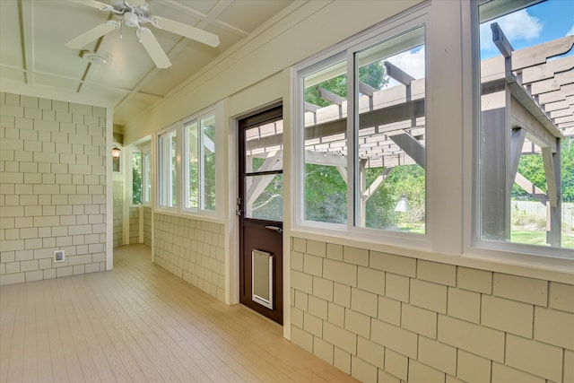 525 Brigham Trl, Augusta, GA 30909 - unfurnished sunroom with tile walls and hardwood / wood-style flooring