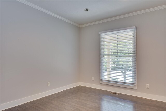 525 Brigham Trl, Augusta, GA 30909 - spare room featuring dark wood-style flooring and crown molding