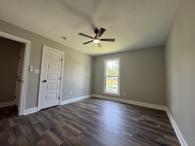 3112 Fieldstone Cir, Augusta, GA 30907 - empty room featuring a ceiling fan, dark wood-type flooring, and baseboards