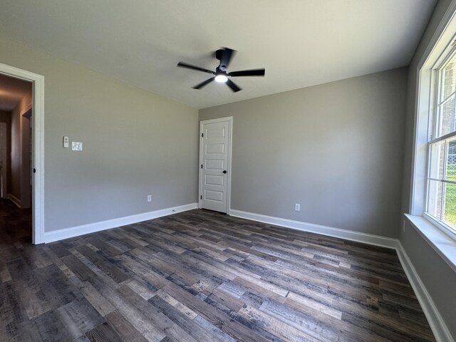 3112 Fieldstone Cir, Augusta, GA 30907 - unfurnished room with dark wood-style flooring, ceiling fan, and baseboards