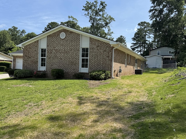 3112 Fieldstone Cir, Augusta, GA 30907 - view of property exterior featuring brick siding, cooling unit, and a garage