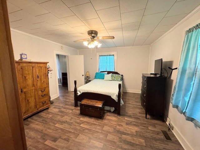 289 Cathy Dr, Warrenville, SC 29851 - bedroom with crown molding, dark wood-style floors, and ceiling fan