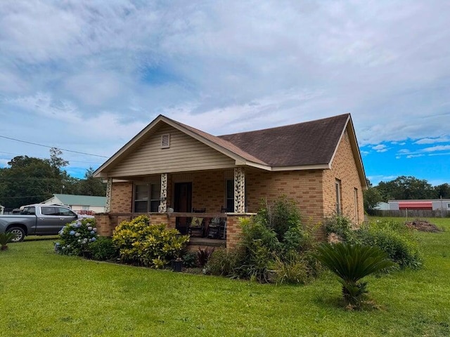 289 Cathy Dr, Warrenville, SC 29851 - single story home with brick siding, a porch, and a front lawn