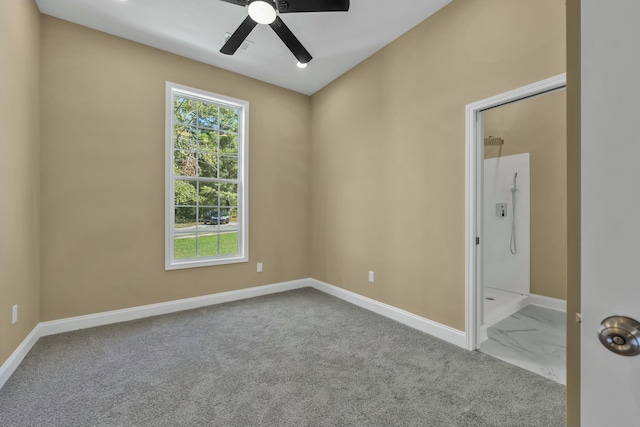 empty room with light carpet and ceiling fan