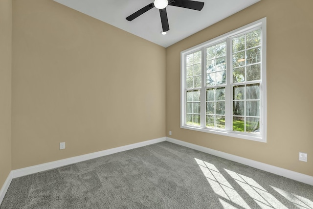 carpeted empty room with ceiling fan