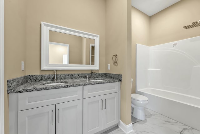 full bathroom featuring vanity, shower / bathtub combination, and toilet