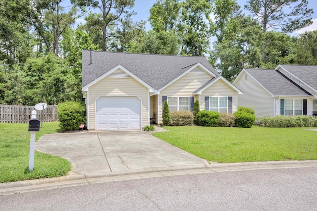 543 Cranberry Cir, Grovetown, GA 30813 - view of front of home featuring a garage, concrete driveway, and roof with shingles