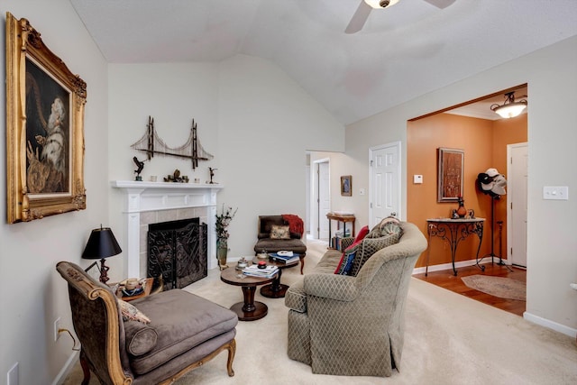 543 Cranberry Cir, Grovetown, GA 30813 - carpeted living area featuring a ceiling fan, lofted ceiling, a tiled fireplace, and baseboards