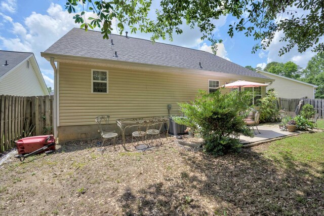 543 Cranberry Cir, Grovetown, GA 30813 - rear view of house featuring a patio area, fence, a shingled roof, and central AC
