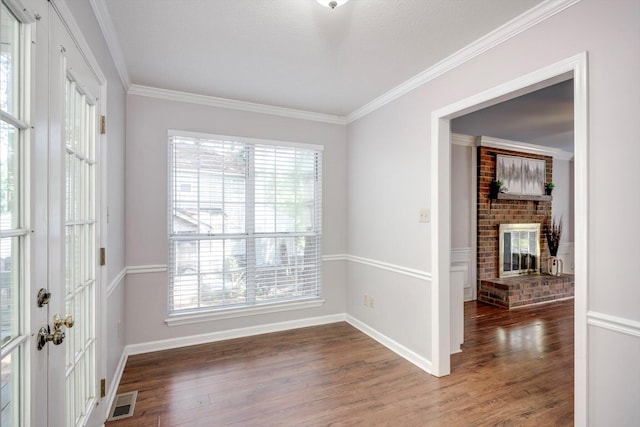 123 Sugar Maple Ln, Martinez, GA 30907 - entryway with wood finished floors, a fireplace, and crown molding