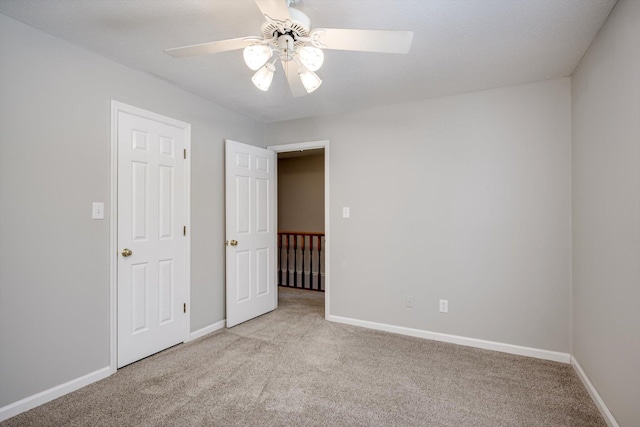 123 Sugar Maple Ln, Martinez, GA 30907 - unfurnished bedroom with light colored carpet and ceiling fan