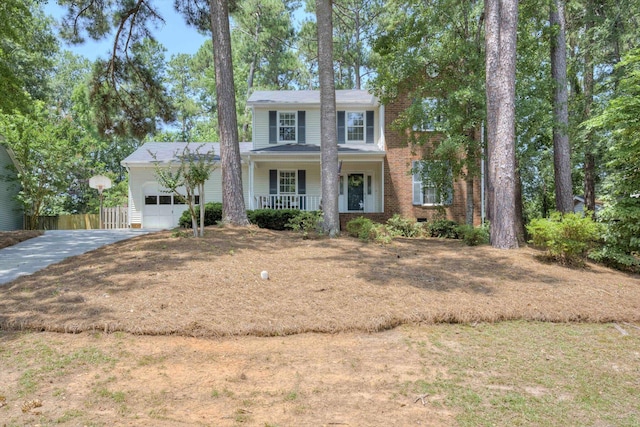 123 Sugar Maple Ln, Martinez, GA 30907 - view of front facade with an attached garage, covered porch, and driveway
