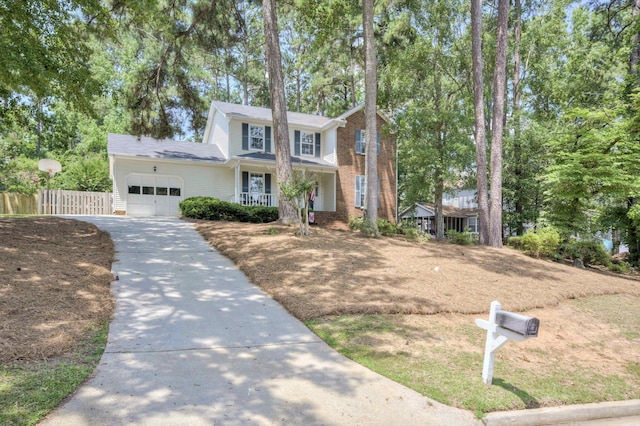 123 Sugar Maple Ln, Martinez, GA 30907 - traditional-style home featuring a garage, concrete driveway, and covered porch