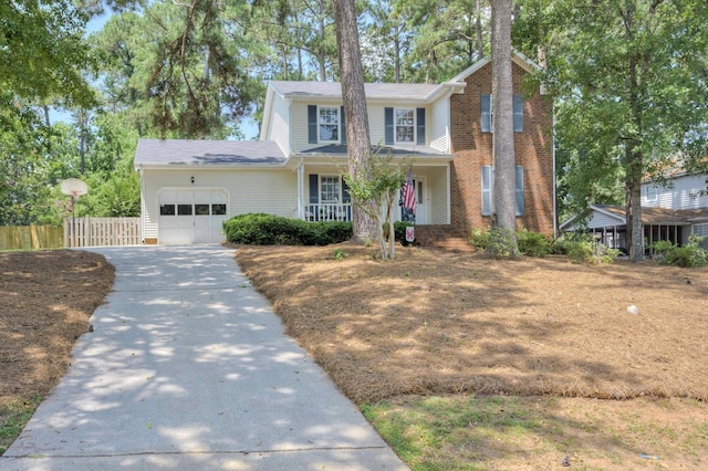 123 Sugar Maple Ln, Martinez, GA 30907 - traditional-style house featuring a garage, driveway, covered porch, and a chimney