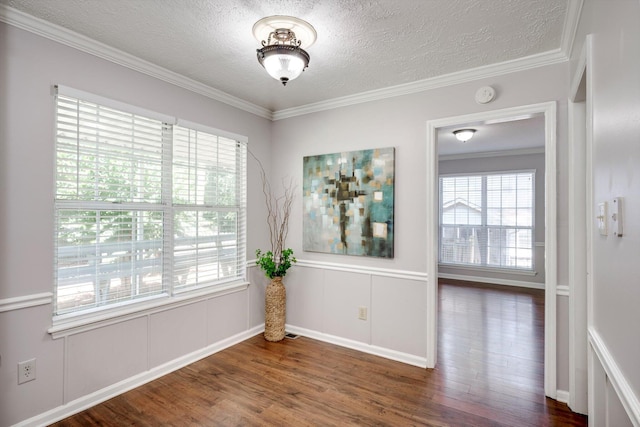 123 Sugar Maple Ln, Martinez, GA 30907 - spare room featuring a smoke detector, a textured ceiling, wood finished floors, and ornamental molding