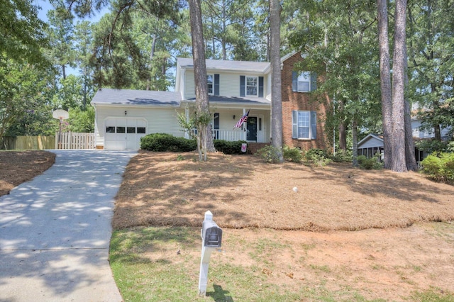 123 Sugar Maple Ln, Martinez, GA 30907 - view of front facade with a garage, a porch, driveway, and brick siding