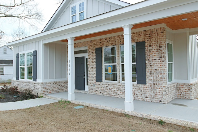 entrance to property with covered porch