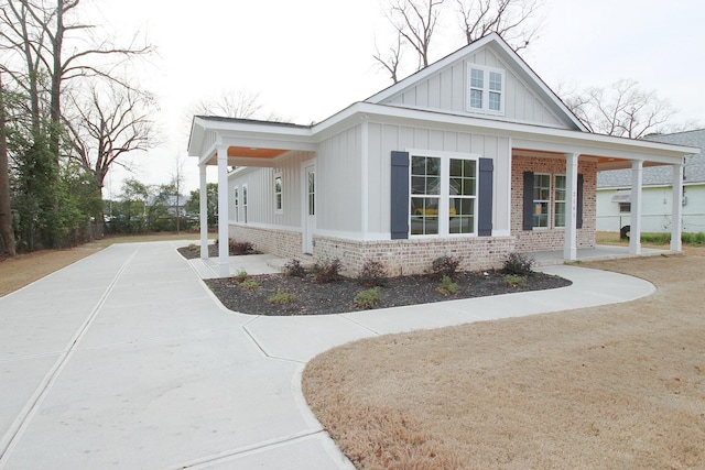 view of home's exterior featuring a carport