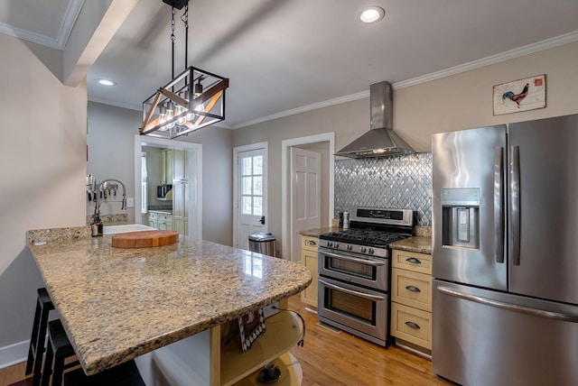 3011 Fox Spring Rd, Augusta, GA 30909 - kitchen with appliances with stainless steel finishes, wall chimney exhaust hood, crown molding, light wood-type flooring, and open shelves