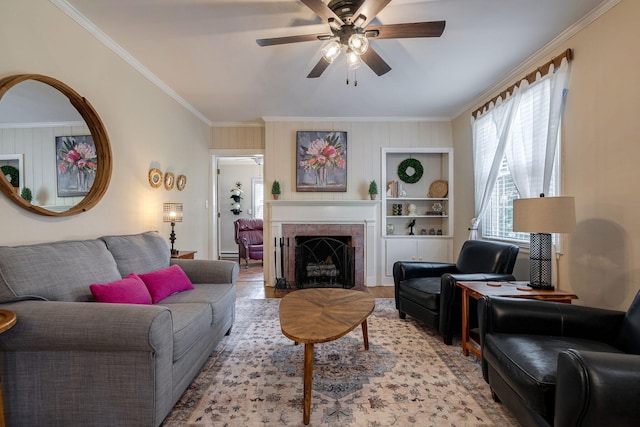 3011 Fox Spring Rd, Augusta, GA 30909 - living room with crown molding, ceiling fan, a fireplace, built in features, and wood finished floors