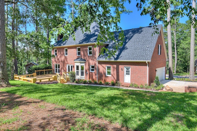 4 Shadowmoor Ct, North Augusta, SC 29841 - view of front of property with concrete driveway, a wooden deck, a shingled roof, brick siding, and a front yard