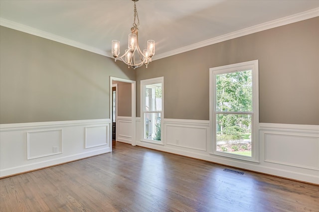 4 Shadowmoor Ct, North Augusta, SC 29841 - empty room with a chandelier, a wainscoted wall, ornamental molding, and wood finished floors