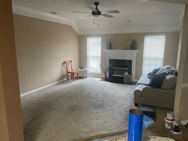 507 Julia Ct, Grovetown, GA 30813 - living room with crown molding, ceiling fan, carpet floors, baseboards, and a fireplace