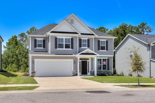 craftsman inspired home featuring central AC, a garage, and a front lawn