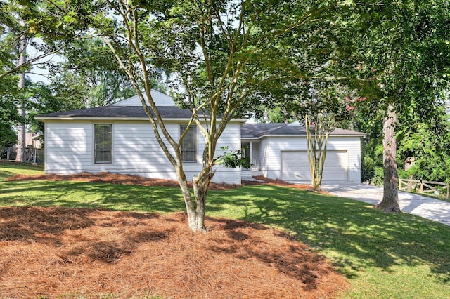 715 Gentlewind Ln, Martinez, GA 30907 - ranch-style house featuring driveway, a garage, a front lawn, and roof with shingles