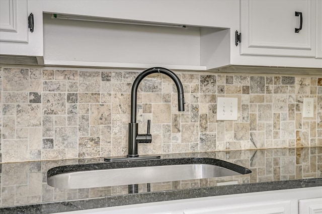 715 Gentlewind Ln, Martinez, GA 30907 - kitchen view of white cabinetry and dark stone countertops