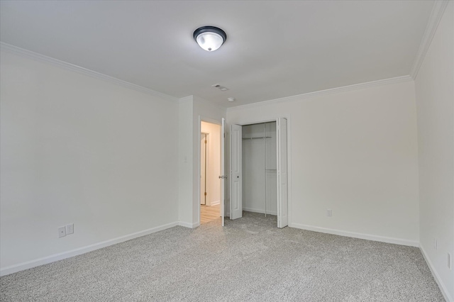 715 Gentlewind Ln, Martinez, GA 30907 - unfurnished bedroom with ornamental molding, light colored carpet, and a closet