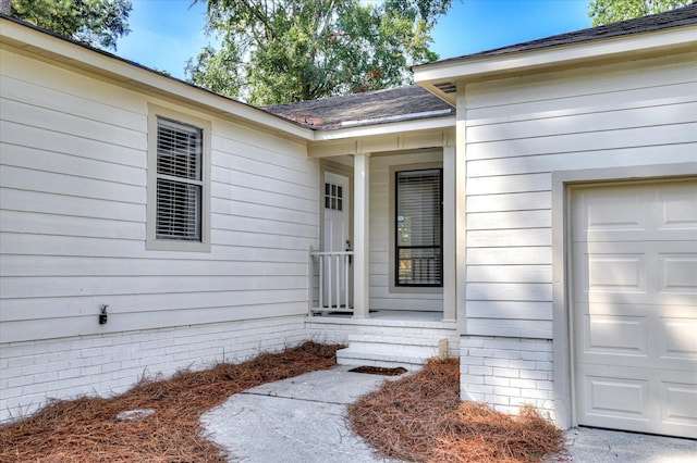 715 Gentlewind Ln, Martinez, GA 30907 - entrance to property featuring a garage and a shingled roof