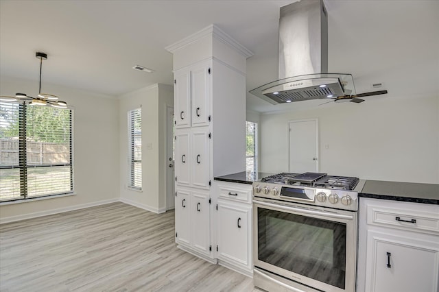 715 Gentlewind Ln, Martinez, GA 30907 - kitchen featuring stainless steel range with gas stovetop, ventilation hood, white cabinets, light wood-type flooring, and ornamental molding