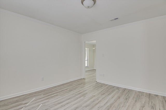 715 Gentlewind Ln, Martinez, GA 30907 - spare room featuring light wood-style floors and ornamental molding