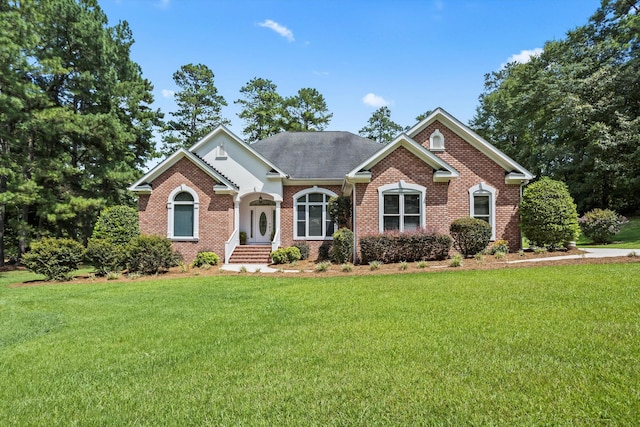 view of front of home with a front lawn