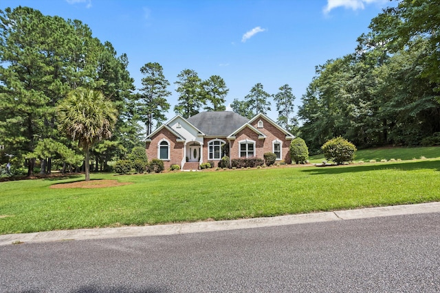 view of front of home with a front lawn