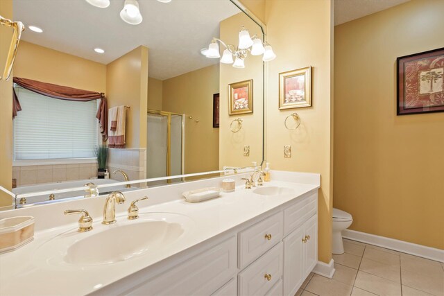 full bathroom with vanity, plus walk in shower, tile patterned flooring, a chandelier, and toilet