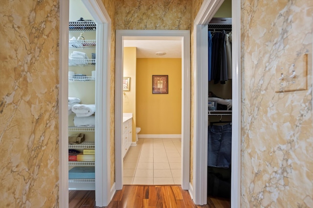 hallway with wood-type flooring