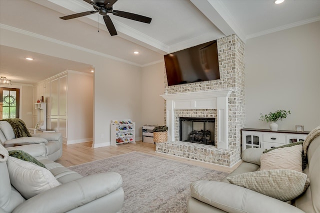 living room with a ceiling fan, recessed lighting, and light wood finished floors