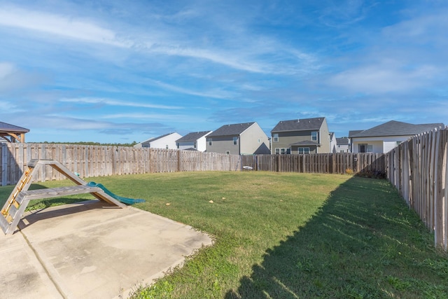 view of yard with a patio area