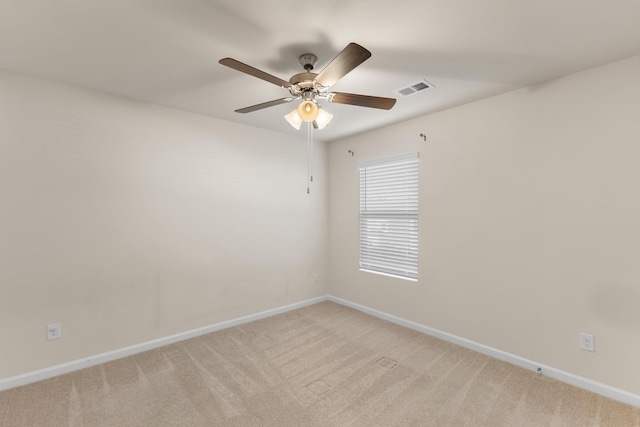 carpeted empty room with ceiling fan