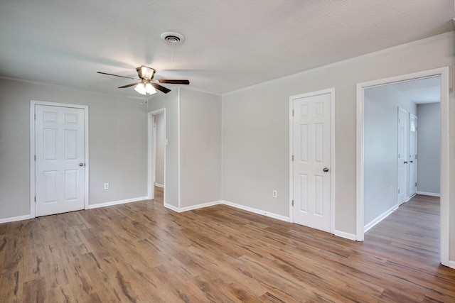 3204 Hillis Rd, Augusta, GA 30906 - spare room with a ceiling fan, wood finished floors, and ornamental molding