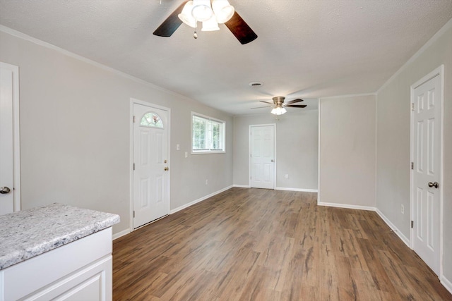 3204 Hillis Rd, Augusta, GA 30906 - unfurnished living room with a ceiling fan, wood finished floors, and ornamental molding