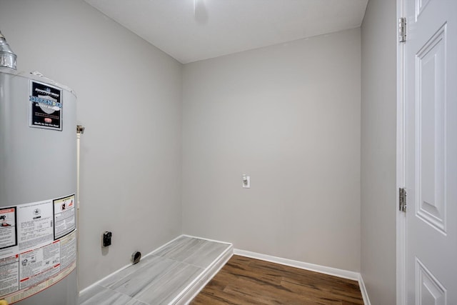 3204 Hillis Rd, Augusta, GA 30906 - laundry room with gas water heater, wood finished floors, and hookup for an electric dryer