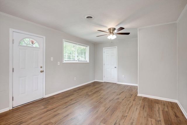 3204 Hillis Rd, Augusta, GA 30906 - entryway with crown molding, healthy amount of natural light, wood finished floors, and a ceiling fan