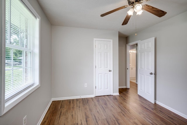 3204 Hillis Rd, Augusta, GA 30906 - unfurnished bedroom featuring wood finished floors, a closet, and a ceiling fan